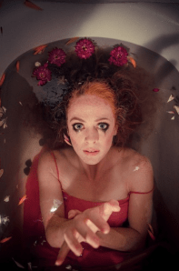 Kirsten Dwyer as the  mad Ophelia in the world premiere production of "Drowning Ophelia" by Repurposed Theatre. Photo credit: Robbie Sweeny.